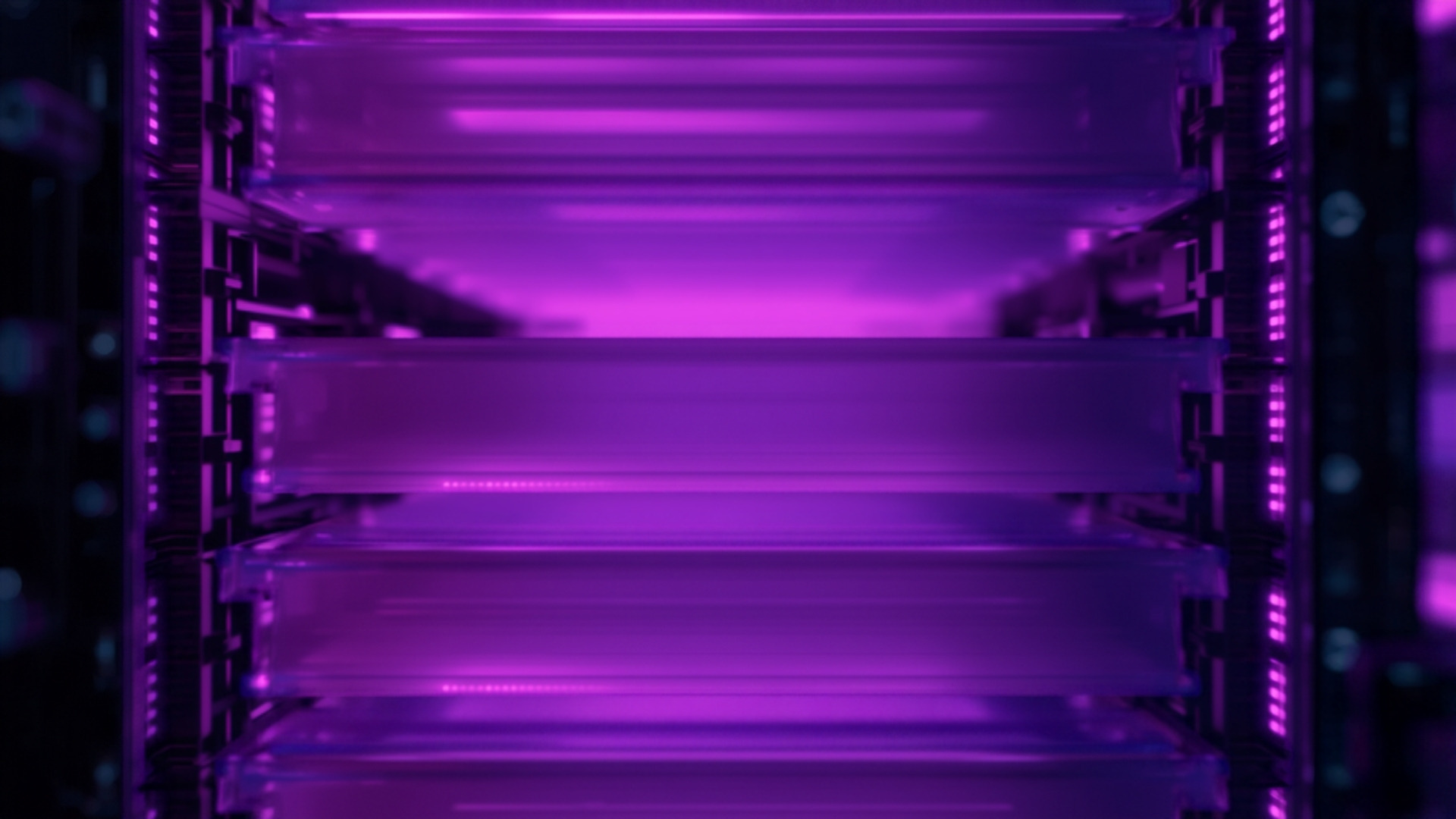Layered translucent glowing panels stacked behind one another in a violet-lit rack