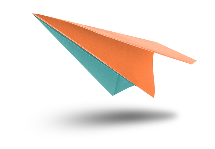 Light blue paper plane in air on white background